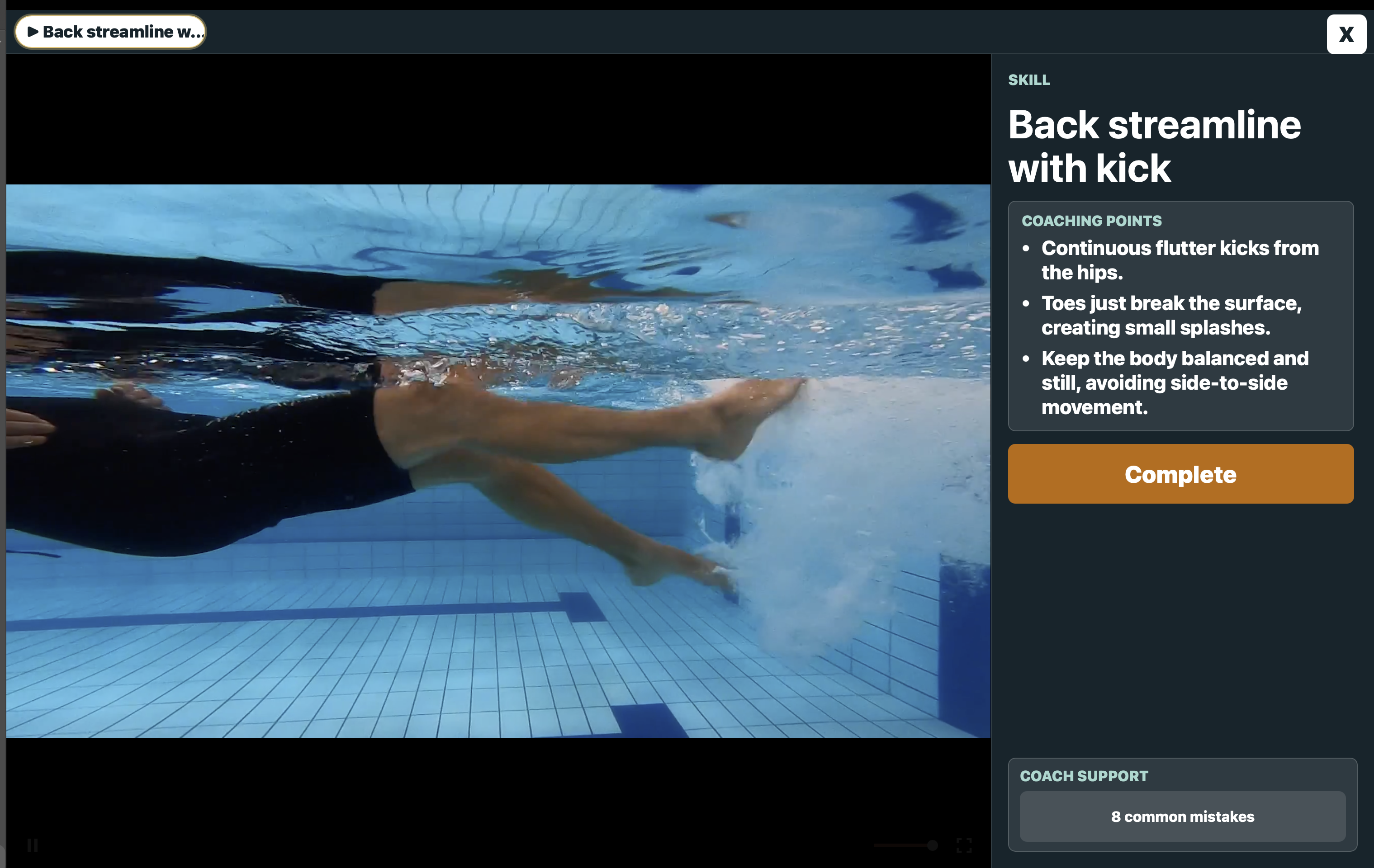 Coaching points shown beside an underwater teaching video